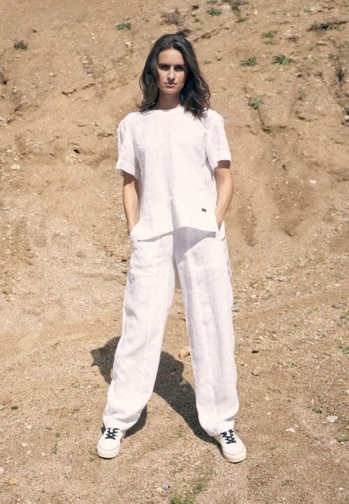 Baltos laisvesnio silueto lininės kelnės